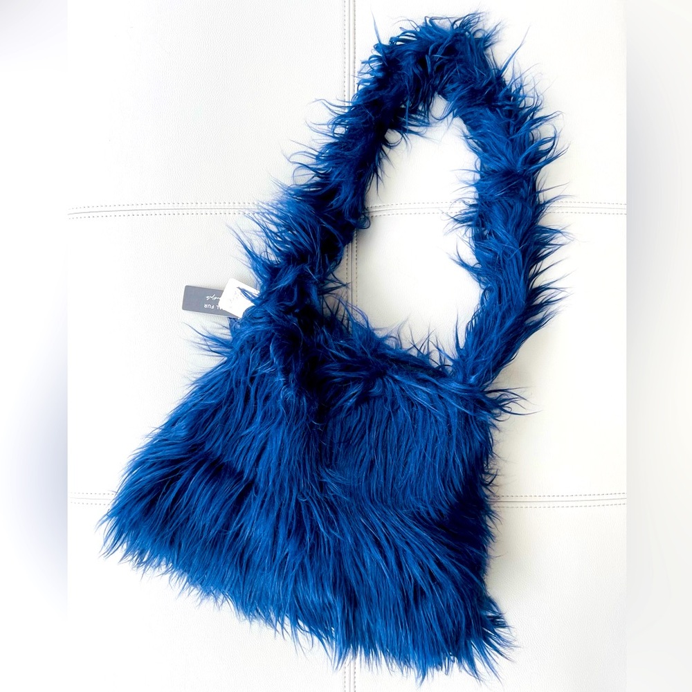 NWT! Free People
Unreal Fur Shoulder Bag
in Navy Baby